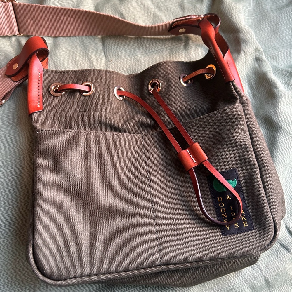 Dooney & Bourke Green Canvas Bag with brown leather Trim “Canvas Drawstring 25”